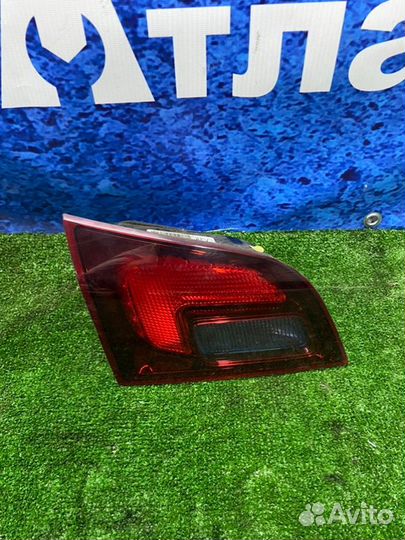 Фонарь в крышку левый Opel Astra J универсал