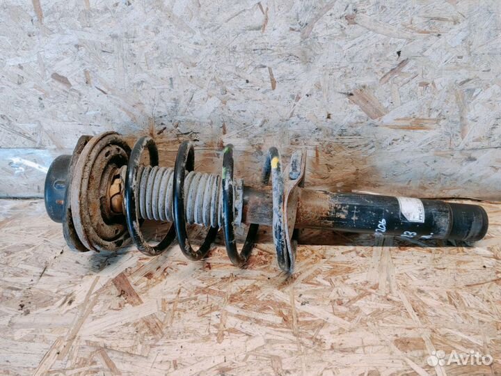 Амортизатор передний левый Peugeot 206