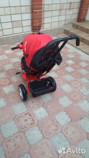 Трехколесный велосипед с ручкой