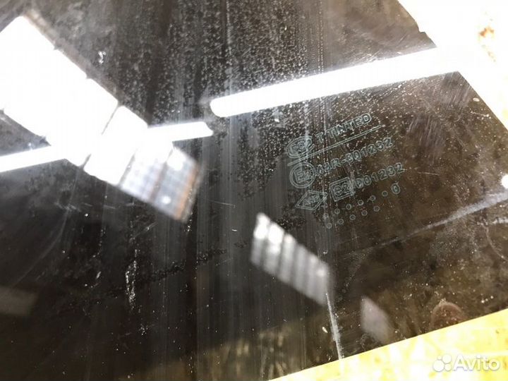 Стекло двери заднее правое Renault Logan седан