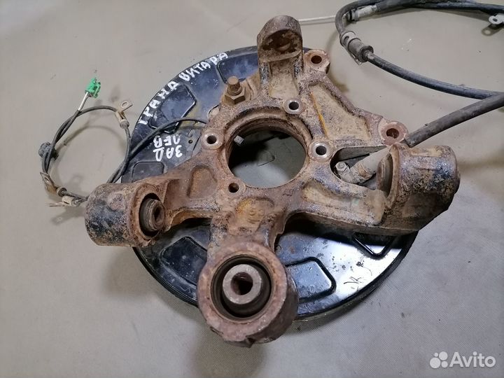 Кулак поворотный задний левый Suzuki Grand Vitara