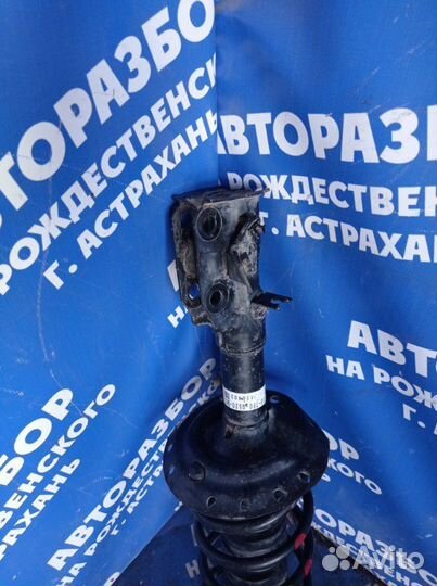 Передняя правая стойка амортизатора Honda Fit