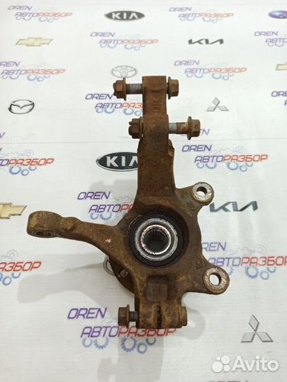 Кулак поворотный передний левый Nissan Note E11