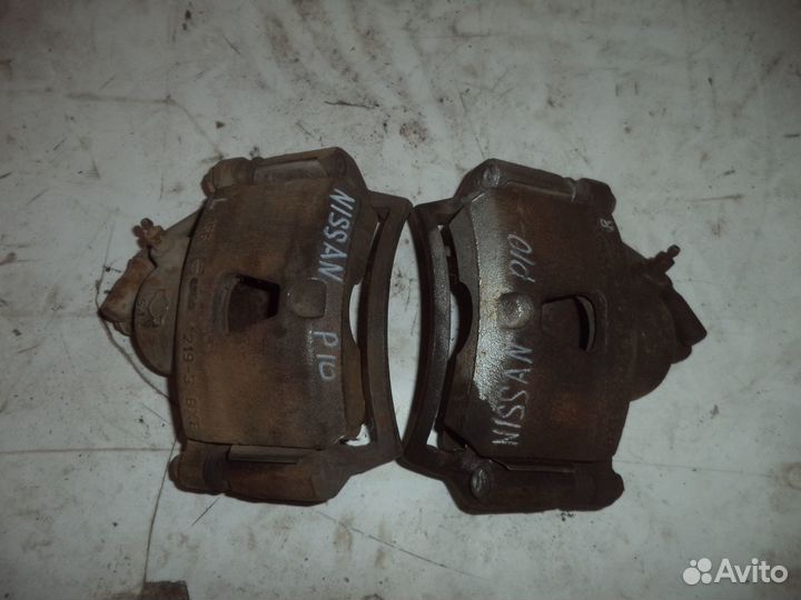 Суппорт тормозной Nissan Primera P10