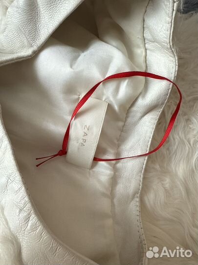 Меховая жилетка