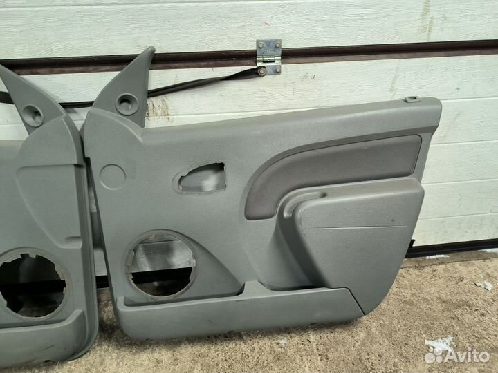 Обшивка двери Renault Logan I 1.4