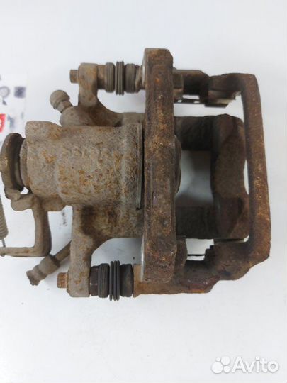 Суппорт тормозной задний левый Opel Mokka