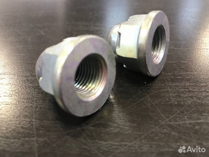 Гайка сход-развального болта заднего продольного