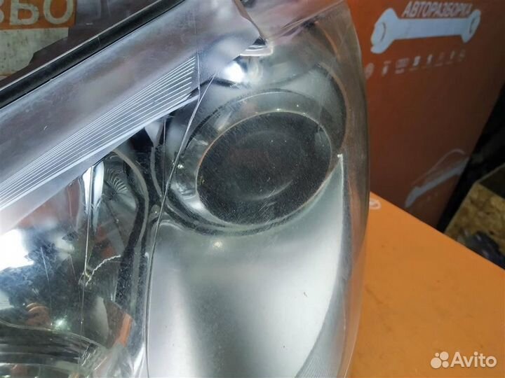 Фара левая Volkswagen Touran 1 (2003-2010)