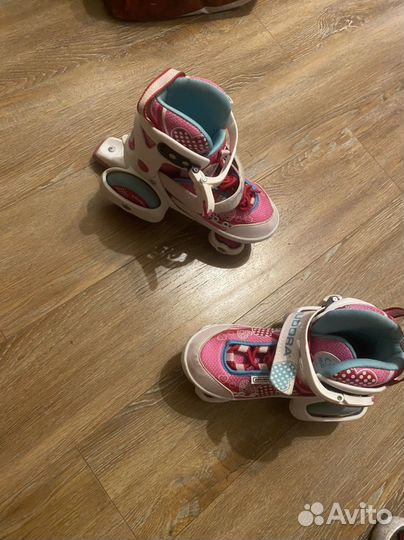 Роликовые коньки