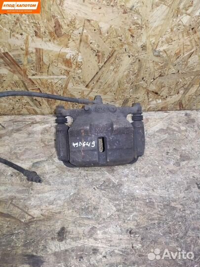 Суппорт тормозной передний правый Nissan X-Trail