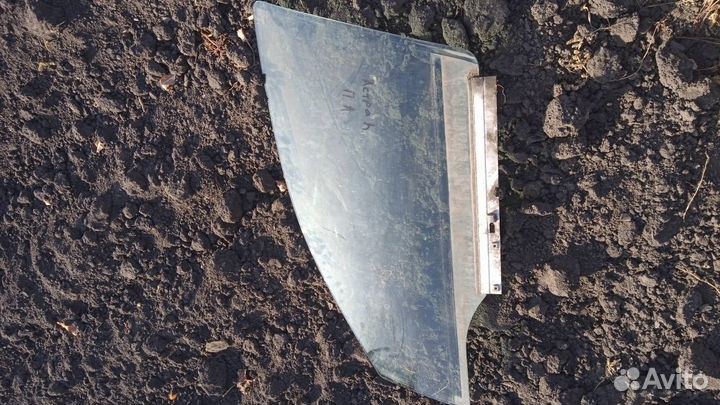 Стекло двери передней левой Opel Astra