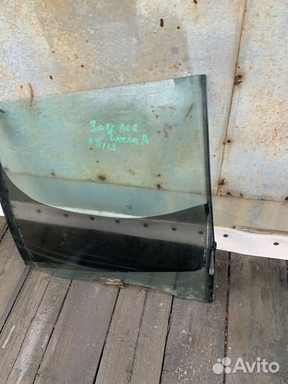 Стекло задние левое Omega A универсал