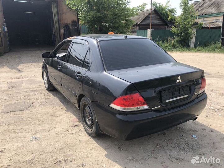 В разборе Mitsubishi Lancer 9 лансер 4g18 1.6