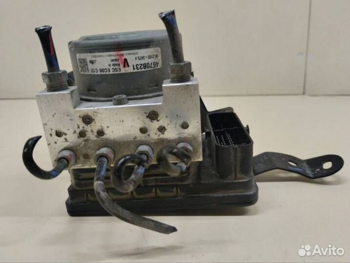 Блок ABS (насос) Mitsubishi Outlander