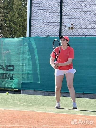 Тренер по большому теннису