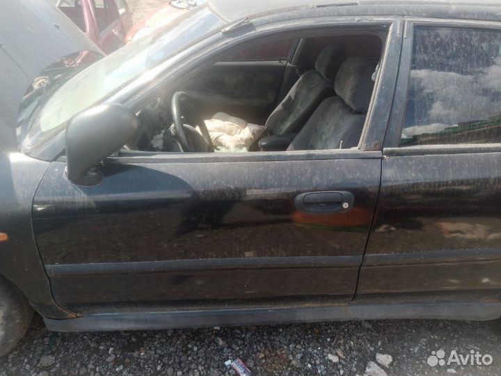 Дверь боковая передняя левая Mitsubishi Carisma