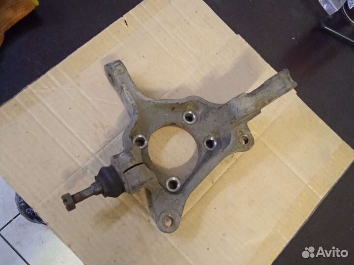 Кулак передний правый Subaru oytback br9