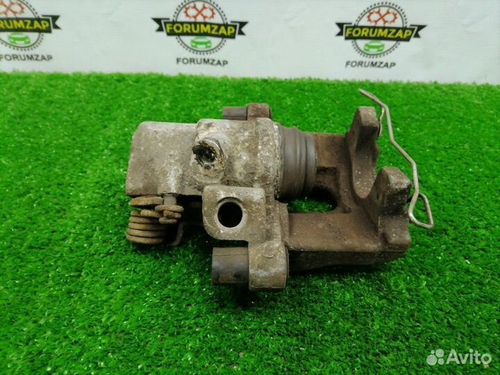 Суппорт тормозной задний правый Ford Focus