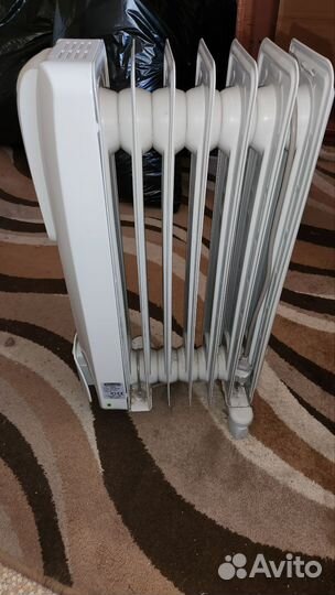 Масляный обогреватель delonghi gs770715