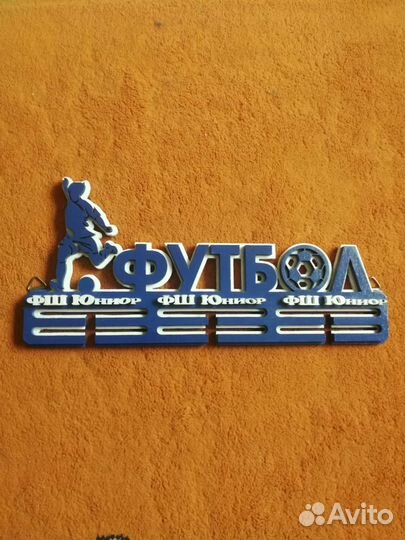 Медальницу футбол
