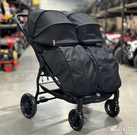 Коляска для двойни погодок