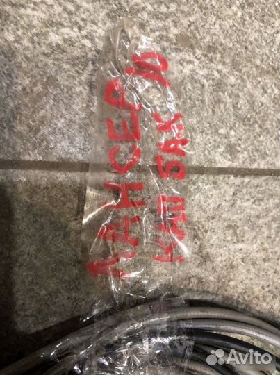 Трос лючка бензобака Mitsubishi Lancer X