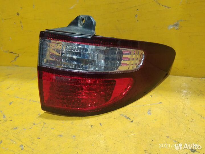 Фонарь задний правый задний правый Toyota Estima