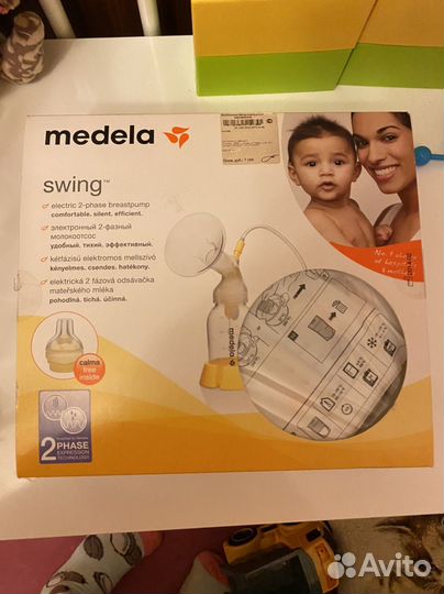 Электрический молокоотсос medela swing