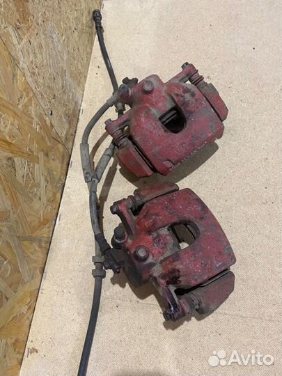 Суппорт тормозной передний Volkswagen Polo cедан