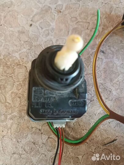 Электро корректор фар