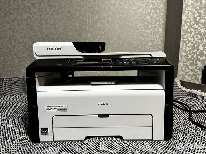 Принтер лазерный мфу ricoh SP 220snw