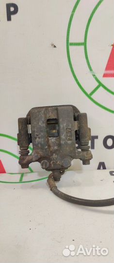 Суппорт тормозной задний левый Nissan Murano Z50