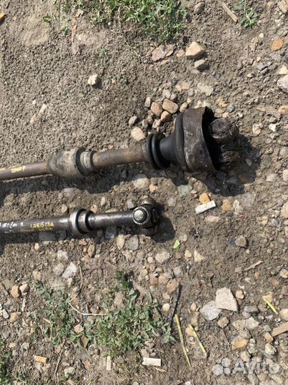 Привод левый Mitsubishi Carisma МКПП