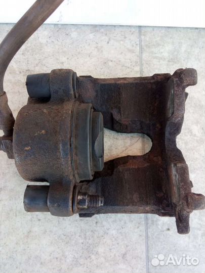 Суппорт тормозной передний правый Opel Astra G