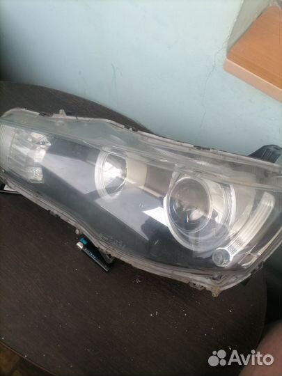 Фара левая на mitsubishi lancer 10