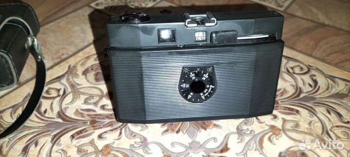 Плёночный фотоаппарат Смена символ