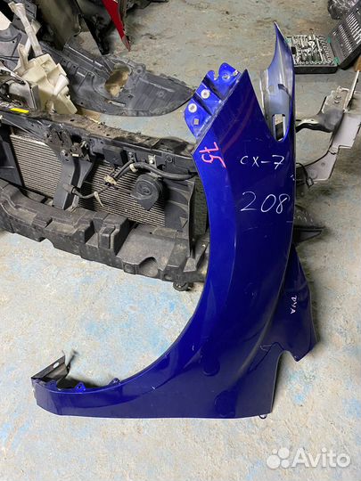 Mazda cx 7 крыло левое