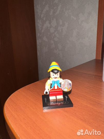 Lego минифигурка пинокио disney 100
