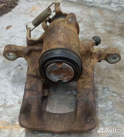 Суппорт задний левый Opel Mokka