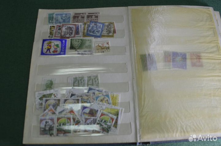 Альбом с марками (примерно 100 штук). Разные тема