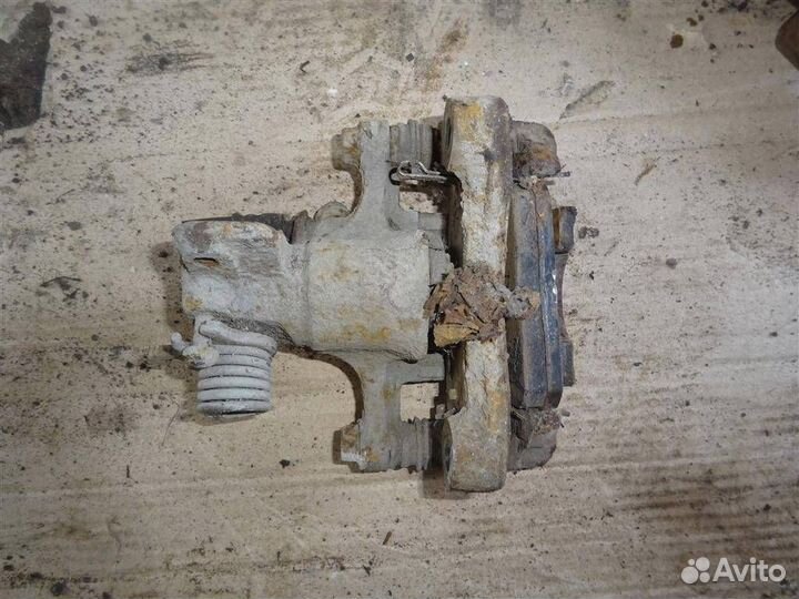 Суппорт задний правый Nissan Almera N15 1995-2000