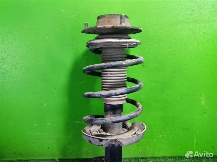 Стойка амортизатора передняя правая KIA Sportage