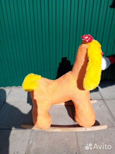 Собака качалка