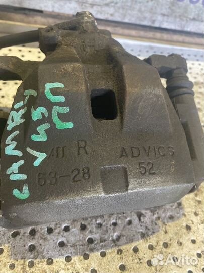 Суппорт тормозной передний правый Toyota Camry