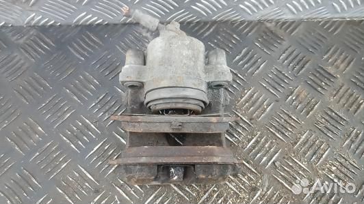 Суппорт тормозной передний левый skoda octavia A5 (YDN20K701)