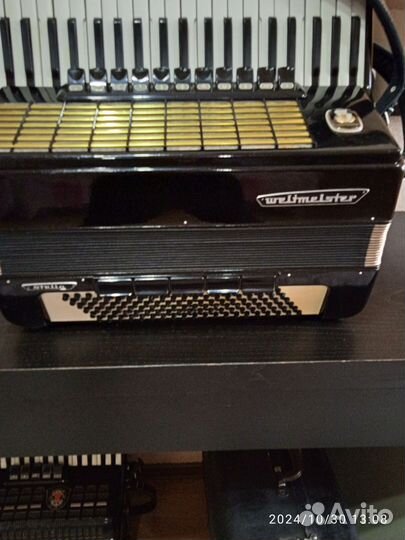 Аккордеон немецкий вельтмастер 4/4
