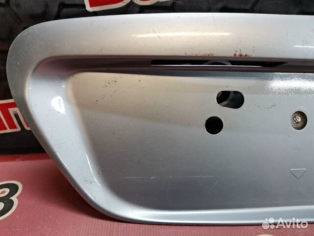 Накладка крышки багажника задняя Mitsubishi Lancer