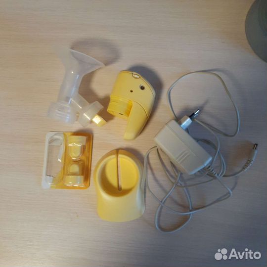Молокоотсос medela электрический
