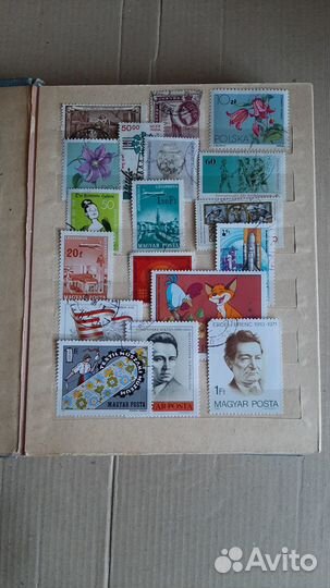 Марки разных стран 224 шт с альбомом